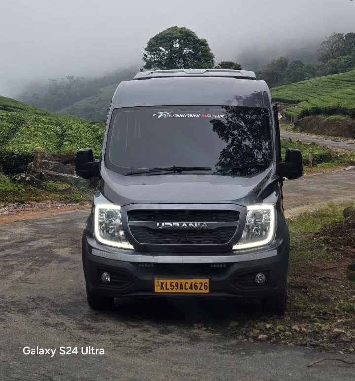 Premium van seating with individual armrests and overhead air conditioning vents