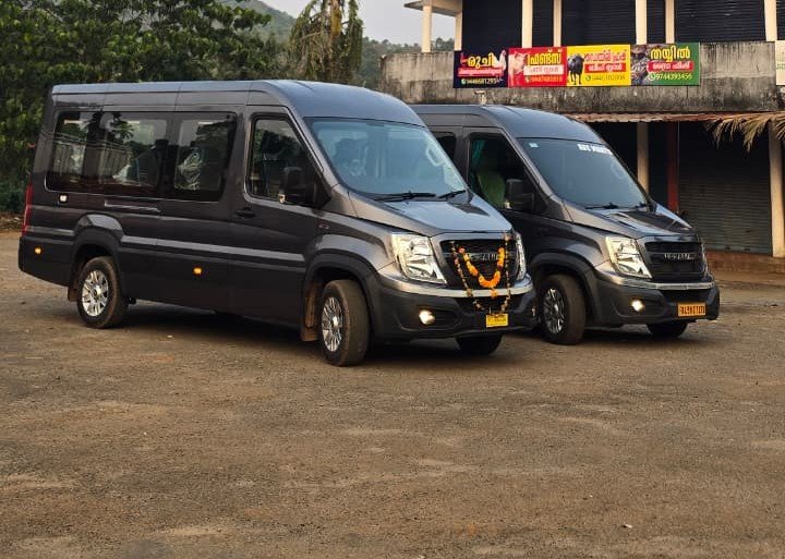 Force Urbania luxury van on a Munnar tea plantation road